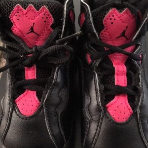 Baby Jordan’s pink and black size 5